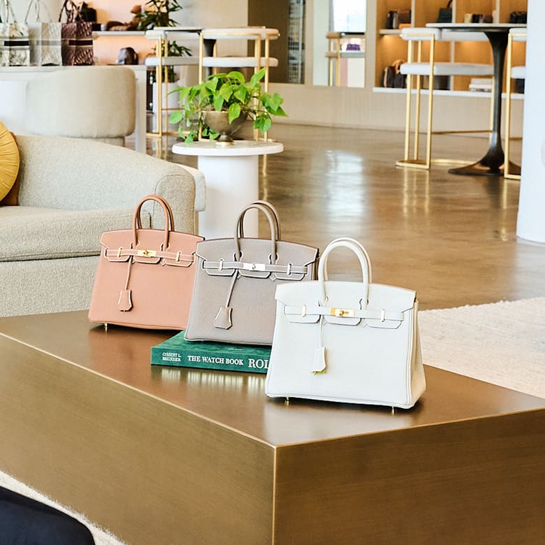 an image of 3 Hermes birkins sitting on a table at our NYC Showroom