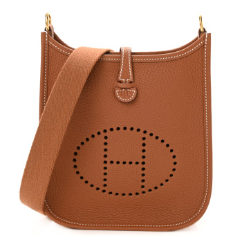 an Hermes Taurillon Clemence Evelyne size TPM in Gold (tan) color