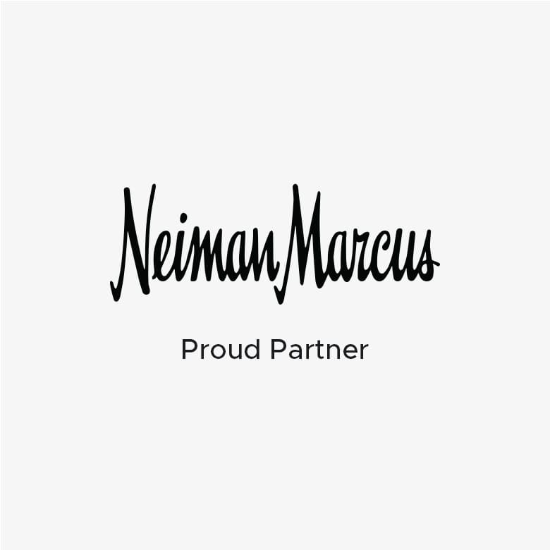 Neiman Marcus Proud Partner" written in black on white background