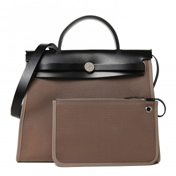 an Hermes Vache Hunter Toile Officier Herbag Zip size PM 31 in the Etoupe (dark grey) and Black colors