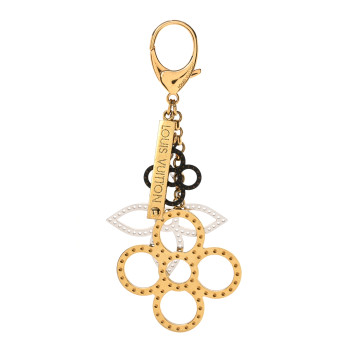 Louis Vuitton gold tone bag charm