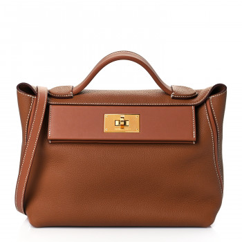 an Hermes Togo Swift 24/24 bag size 29 in the Gold (tan) color
