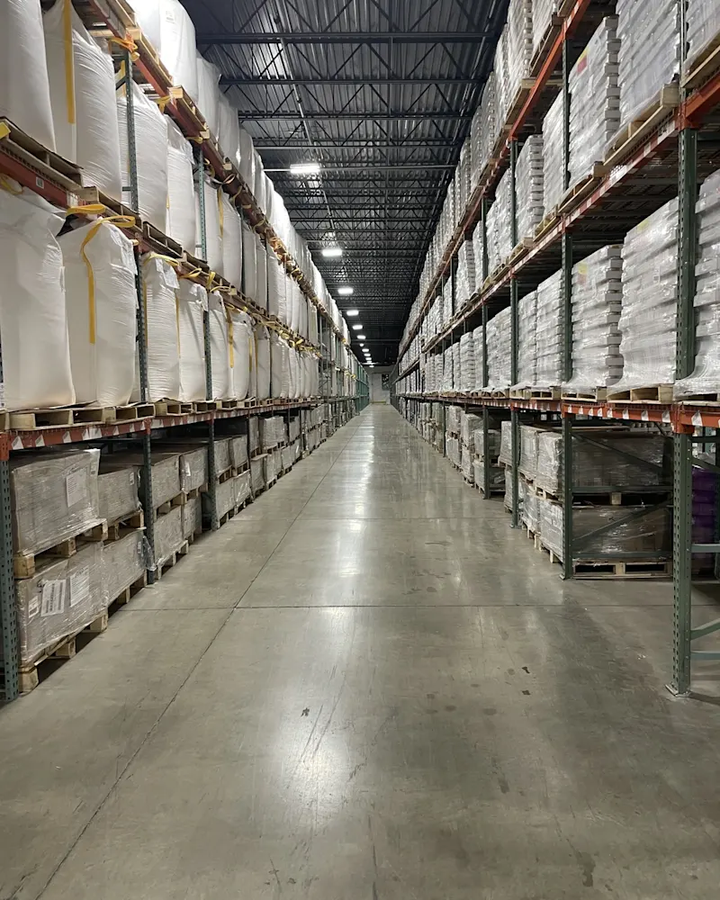 warehouse-interior-stacks-of-sacks-and-boxes-on-shelves