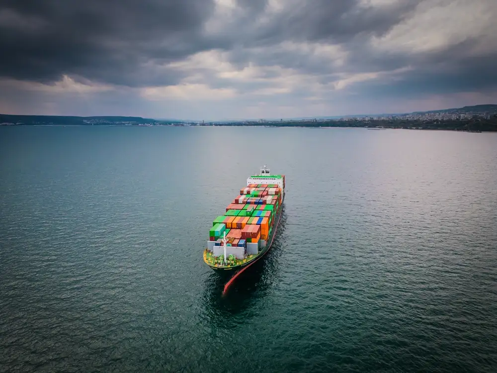 a-loaded-container-ship-in-the-sea-aerial-view-c-2025-03-16-12-41-45-utc