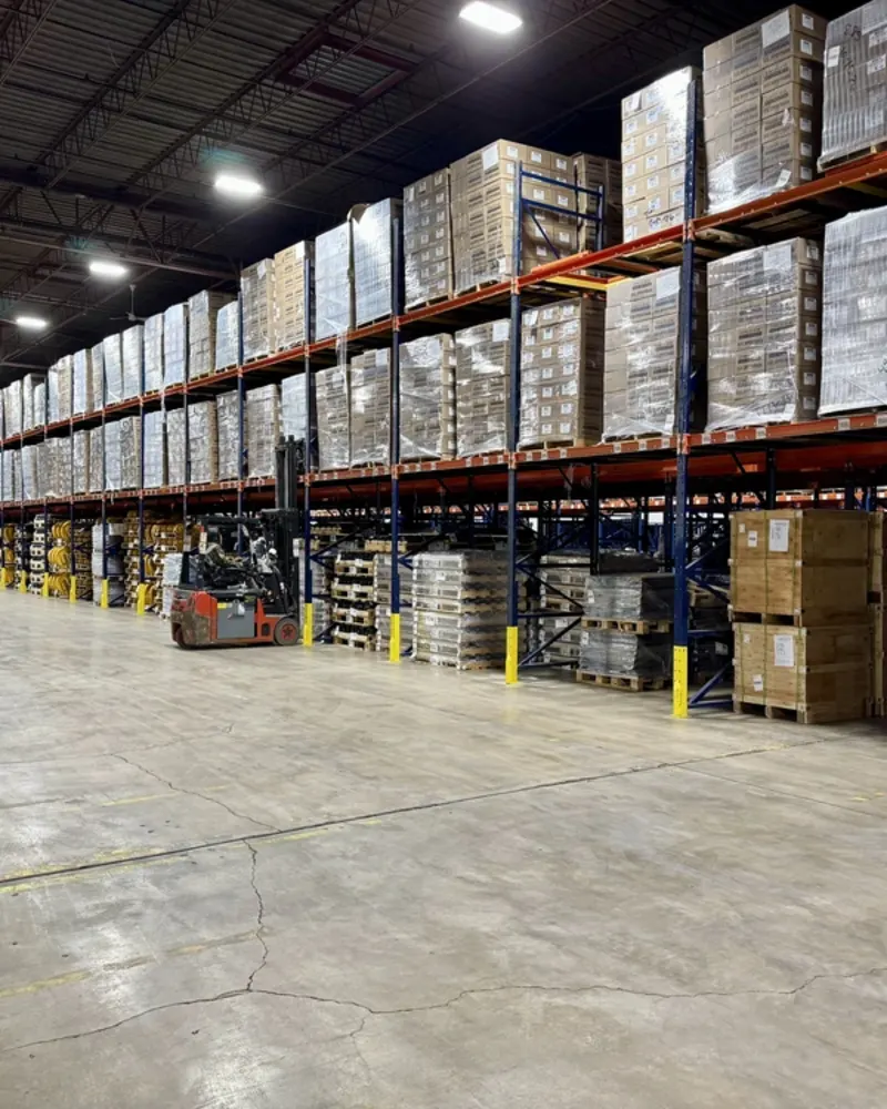 warehouse-interior-large-boxes-on-shelves-long-angled-perspective-shot