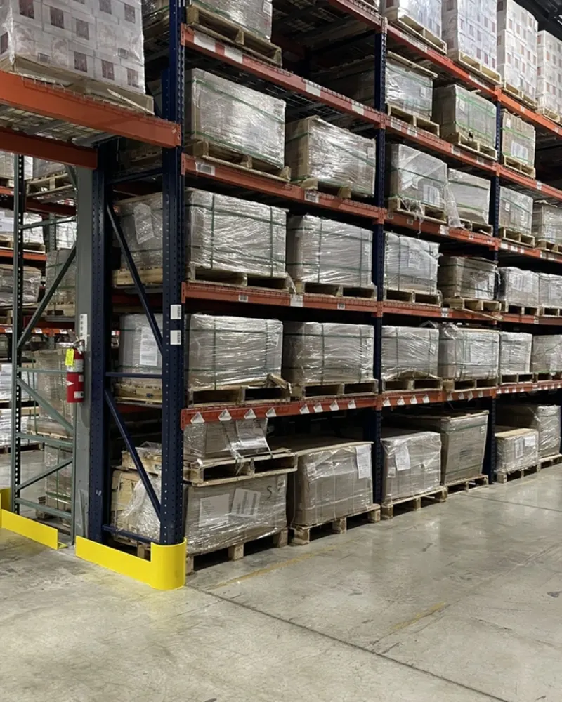 warehouse-interior-stacks-of-boxes-on-shelves-with-archeway-1