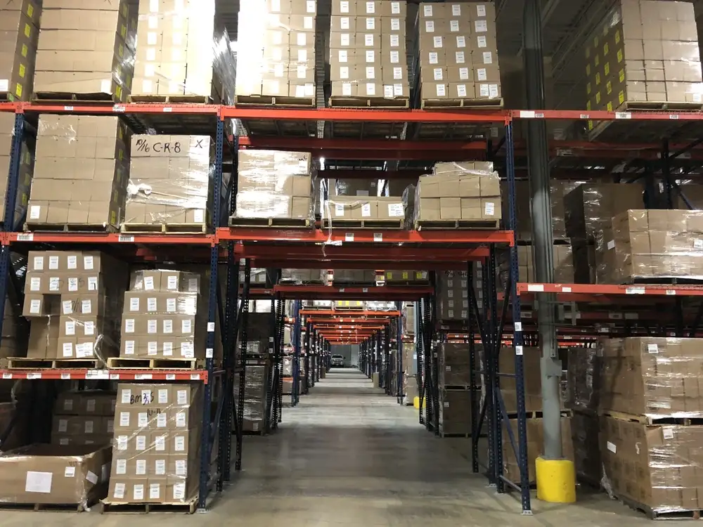 warehouse-interior-stacks-of-boxes-on-shelves-with-archway-2