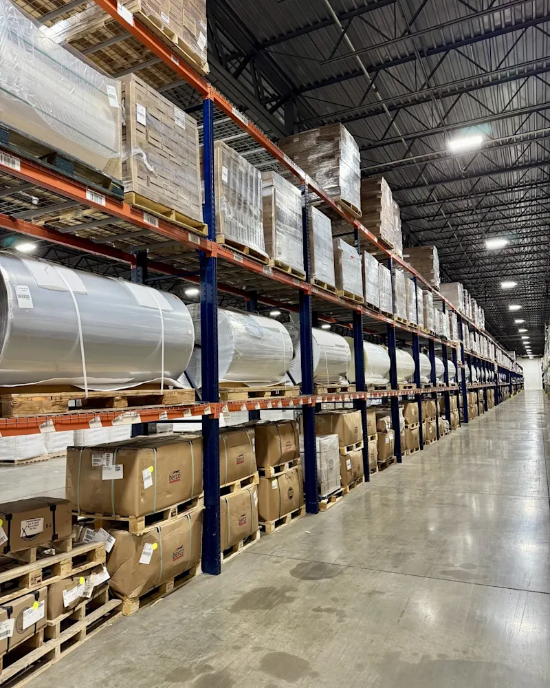 warehouse-interior-barrels-and-boxes-on-shelves