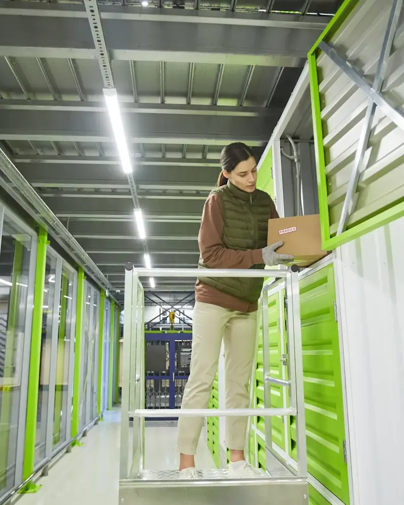 person-standing-on-a-green-railing-2023-11-27-05-31-54-utc (1)