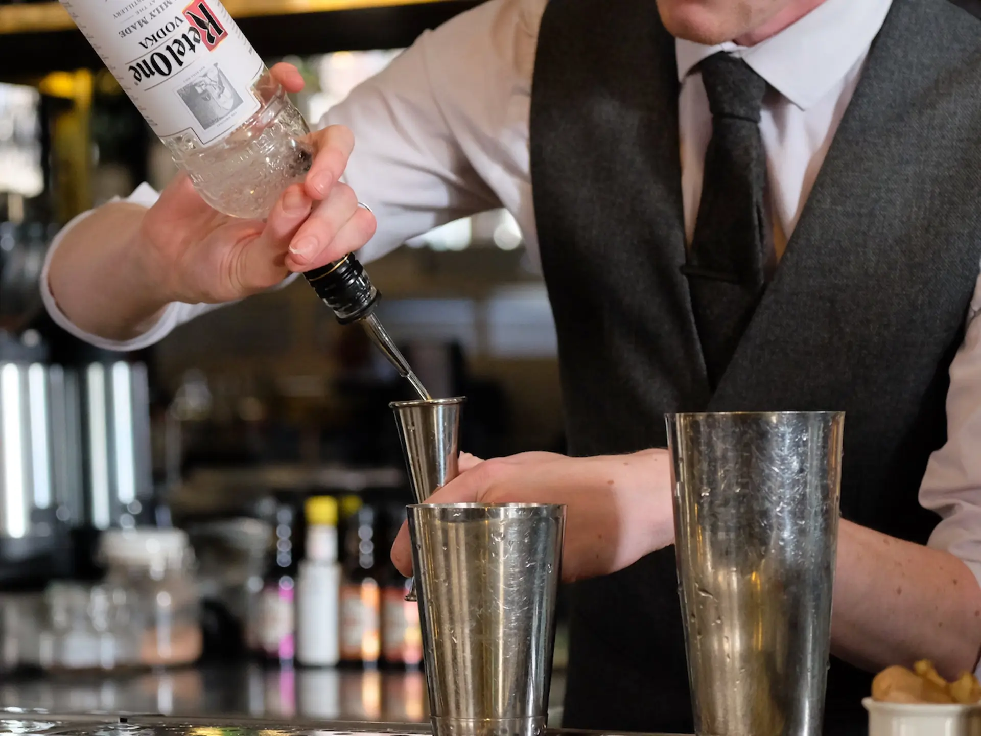 Ketel One High Bottle Neck Bartender Pouring