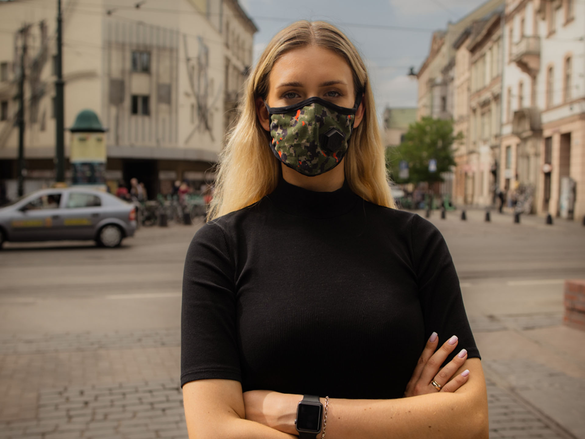 Alicja Baczyk standing in a street with a face mask on