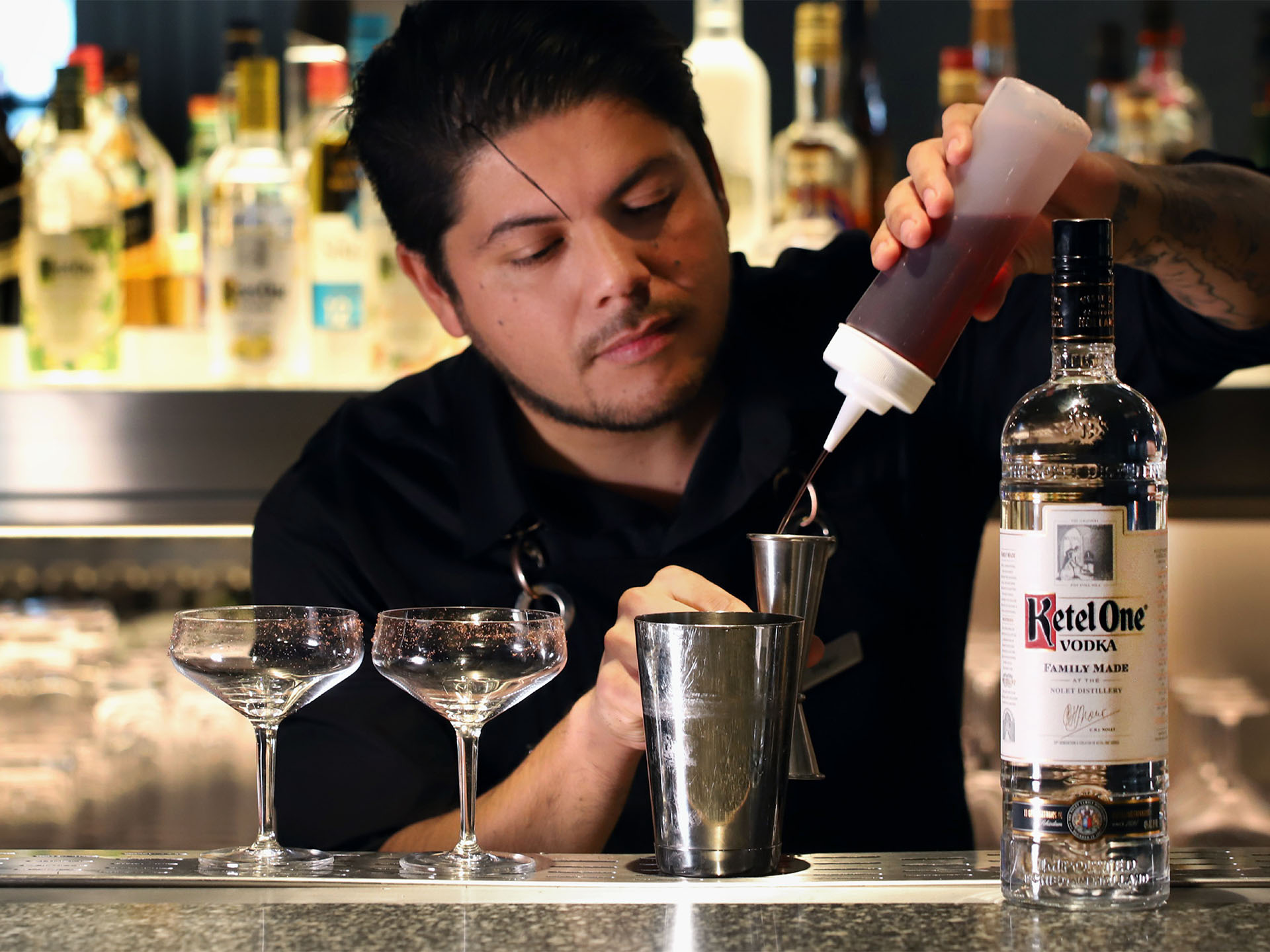Edgar Pacheco preparing a cocktail with Ketel One Vodka