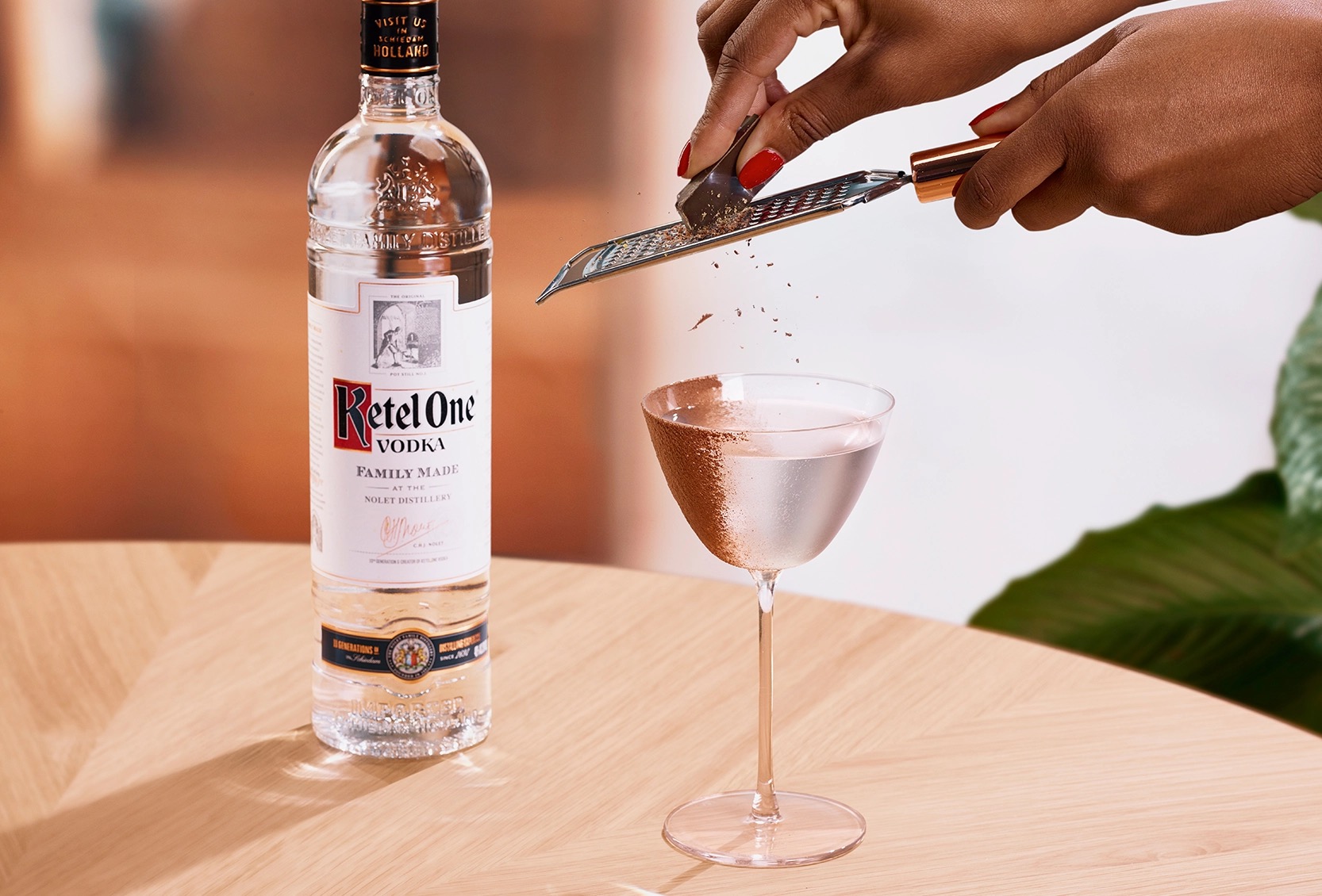 Ketel One Chocolate Martini in Coupe Glass with hand grating chocolate