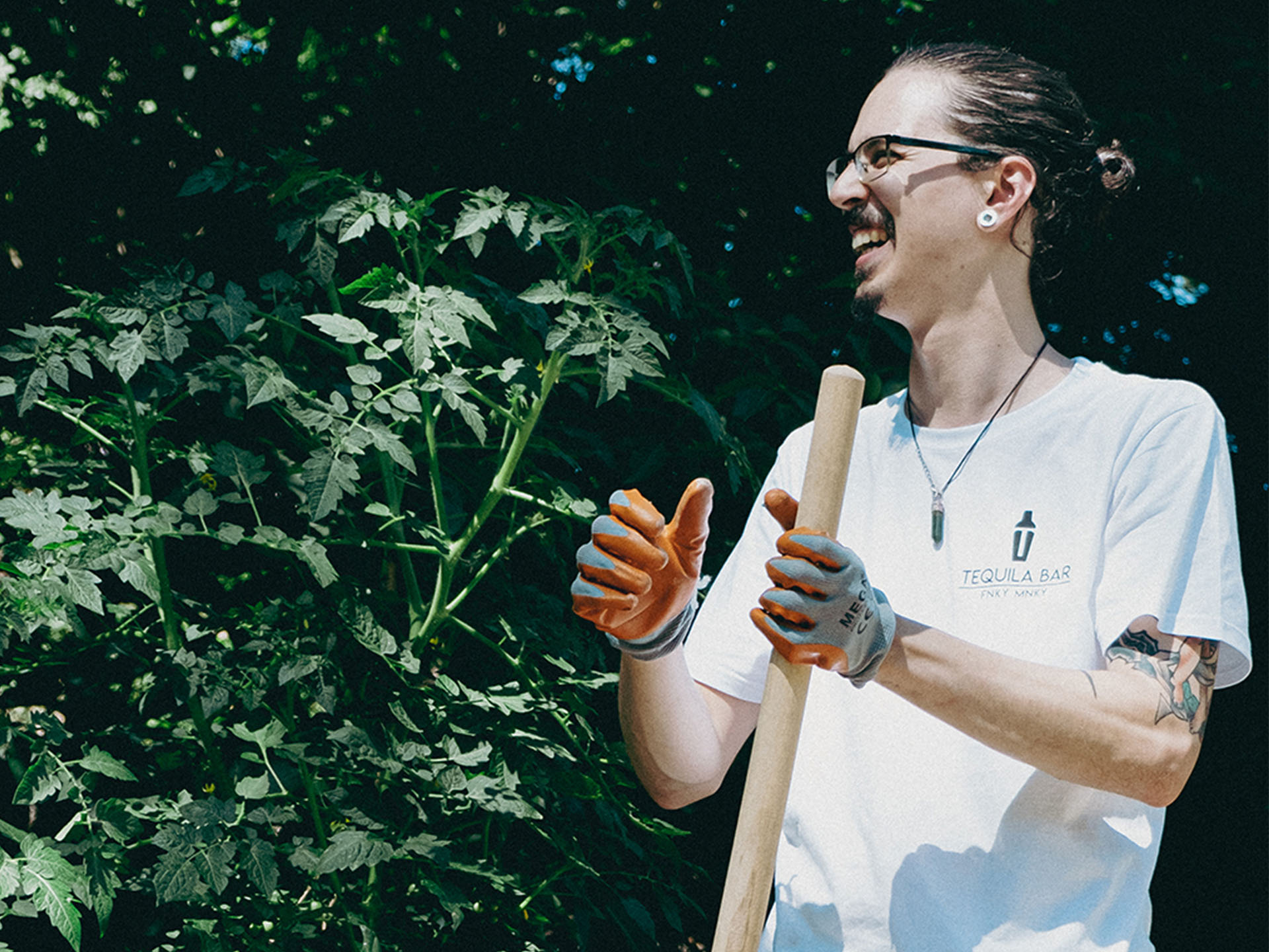 Manol Lazarov laughing outside by a tree