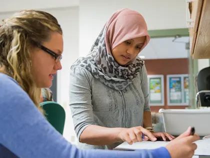 Two people working in a lab at Penn State Fayette.