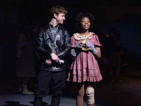 Photo of students in costume on stage