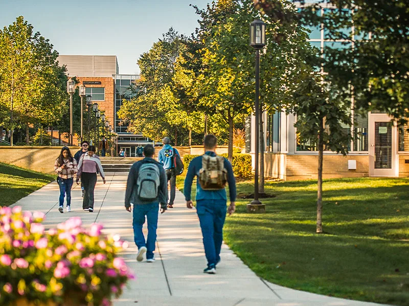 People walking outside on campus at Penn State York.