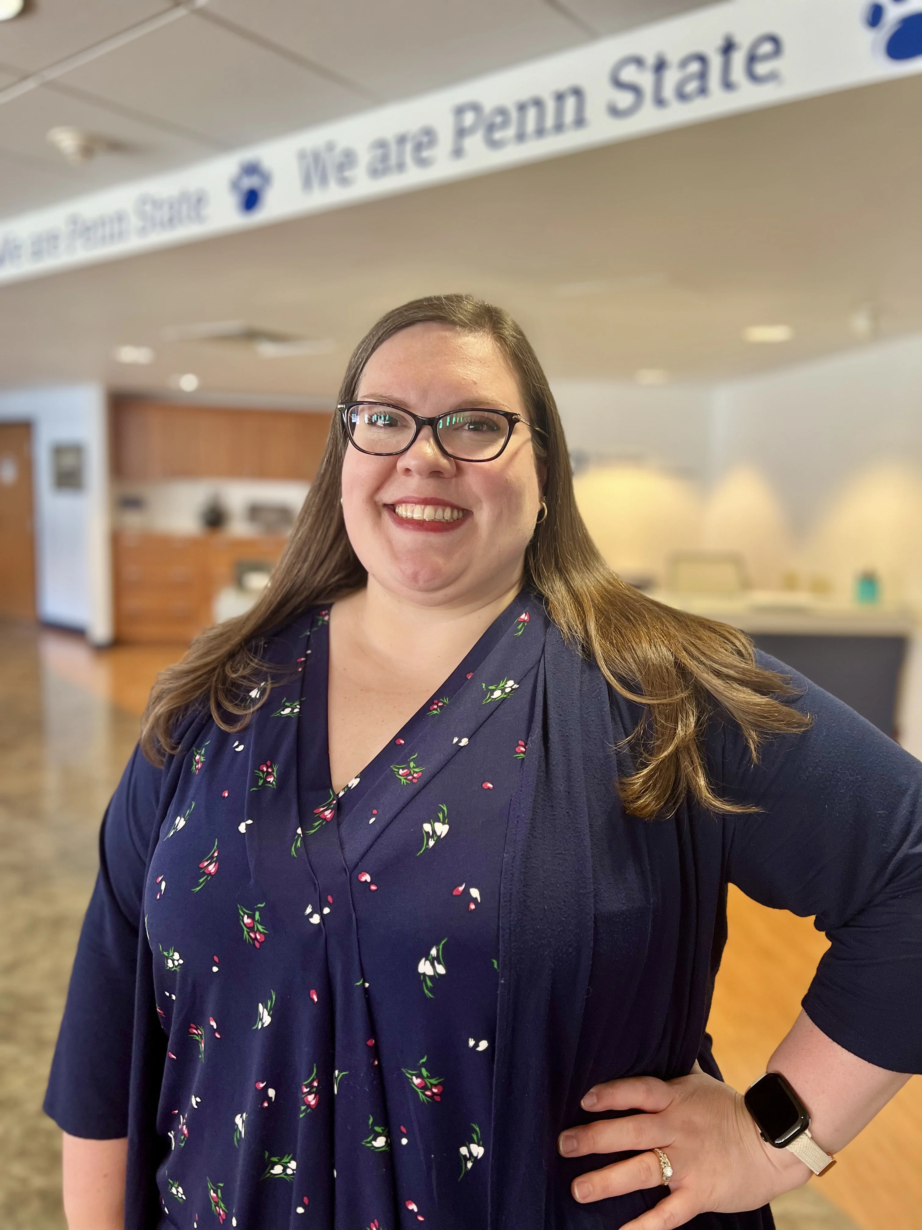 Lindsay Bolt headshot wearing glasses and navy top