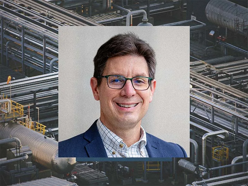 Kenneth Knappenberger's headshot overlayed on a background of industrial infrastructure.
