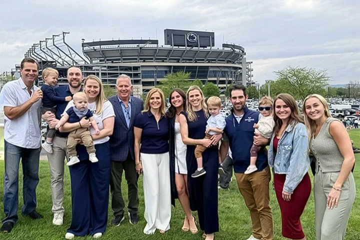 The Mullin family stand in front of Beaver Stadium