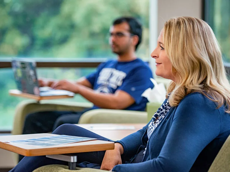 Photo of graduate students sitting in a classroom