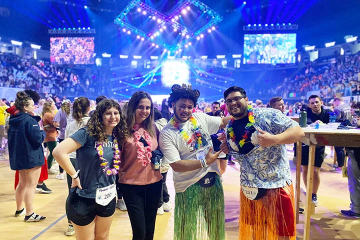 Photo of four students at THON