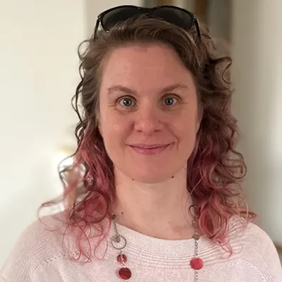 Lisa Timm, the patient, smiling at the camera