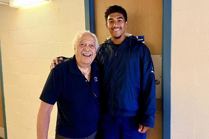 John Robinson embraces his grandson Wes Robinson during move-in day at Beaver Hall on the University Park campus