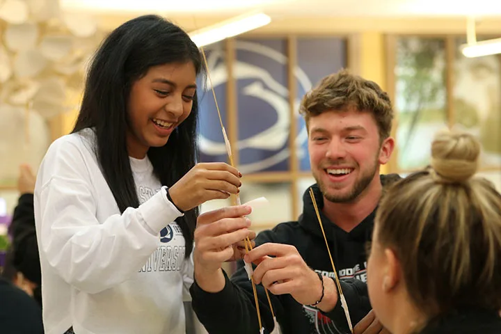 Photo of students participating in a team-building activity together