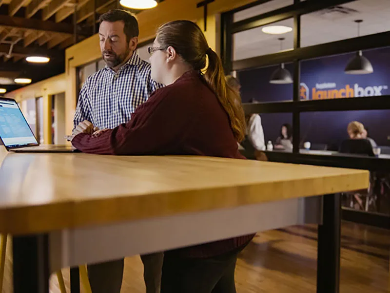 Two people have a meeting at the Penn State Hazleton LaunchBox