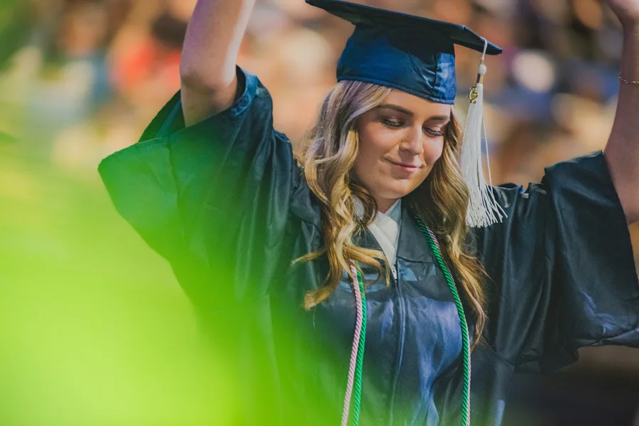 Photo of a student at their commencement ceremony