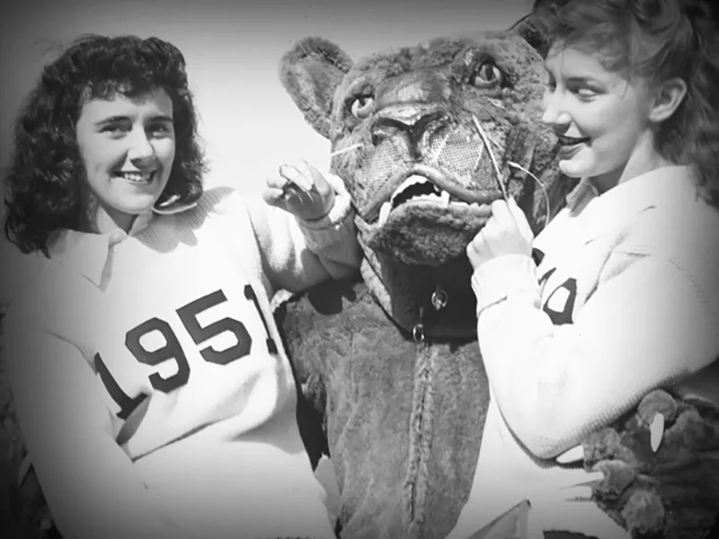 Throwback image of students with the Nittany Lion Mascot