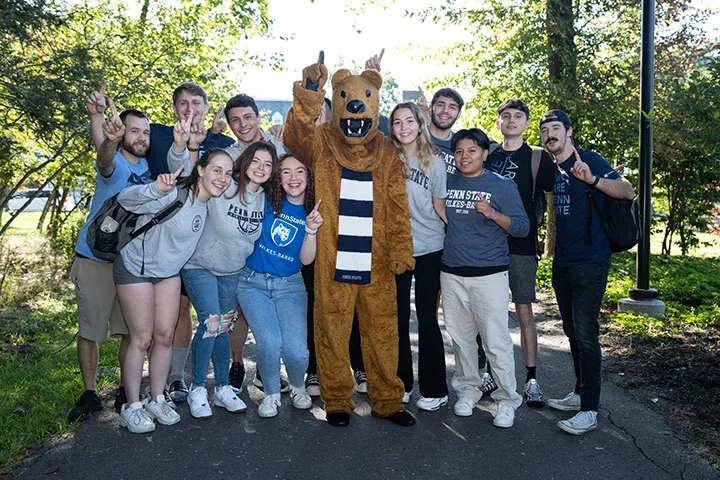 Photo of a group of students posing with the Nittany Lion mascot