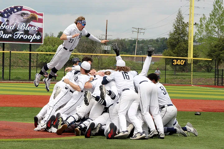 Photo of DuBois baseball team celebrating on the baseball field