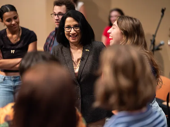 Neeli Bendapudi interacting with a group of students
