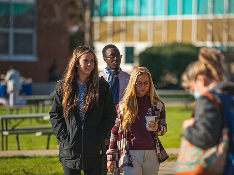 Two students walking on campus at Penn State Dubois.