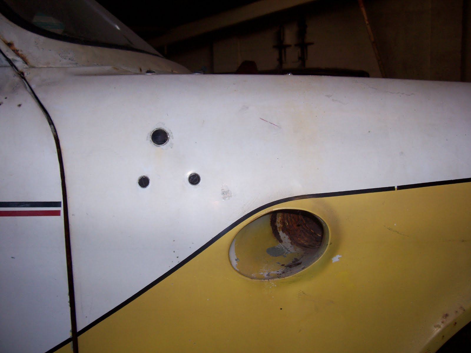 Front wing vent, and spotlight mounting detail. Front wing vent, and spotlight mounting detail.