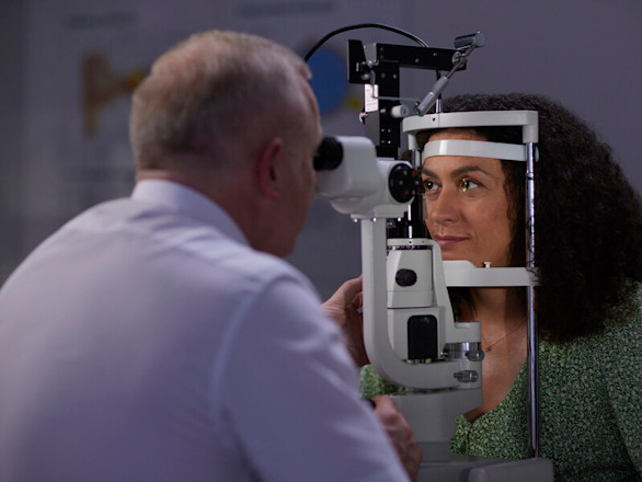 Women using a slit lamp
