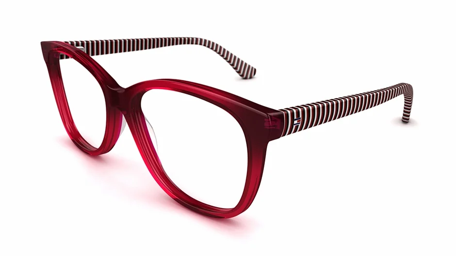 Red eyeglasses with striped temples on a white background.