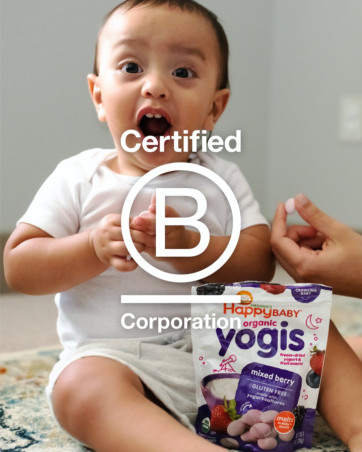 Surprised baby with B Corp Logo in foreground