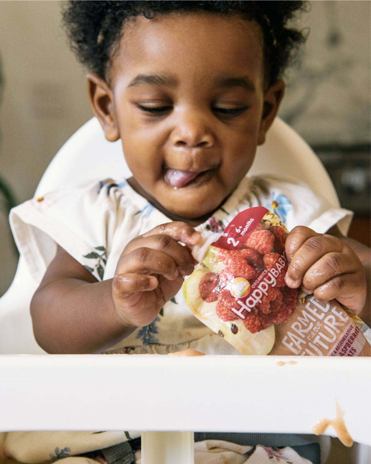 Baby girl eating Regenerative pouch