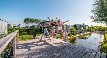 Bad Meersee family jump joy bridge kids mother