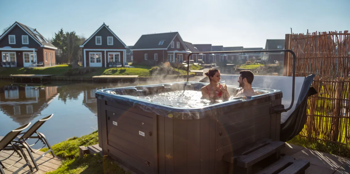 EuroParcs IJsselmeer Jacuzzi Couple Wine Water Accommodations Vacation Rentals Holiday Villa
