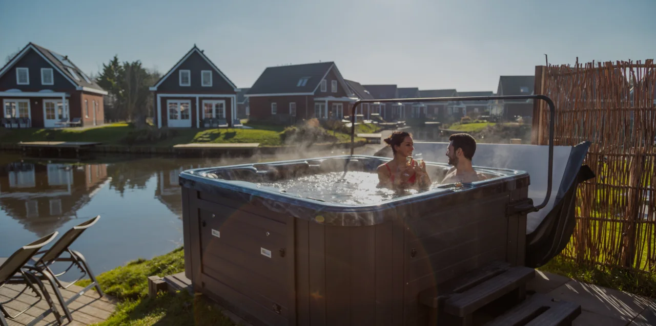 EuroParcs IJsselmeer couple jacuzzi water villa wellness romantic weekend away - dark-