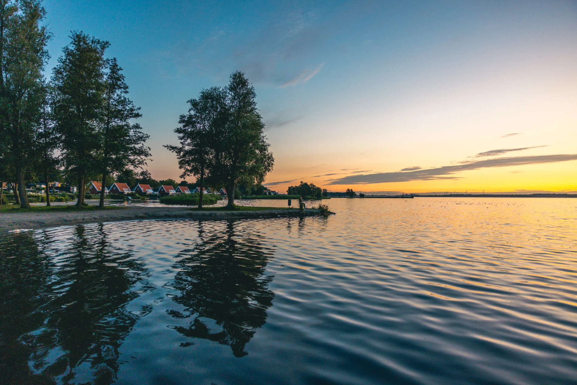 EuroParcs Veluwemeer holiday park sunset water holiday homes