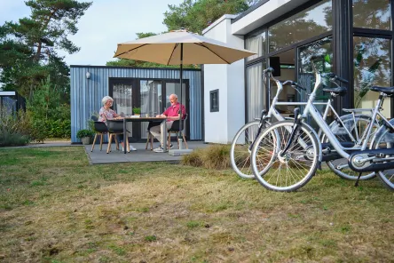 Koppel fietsen zon accommodatie De Zanding