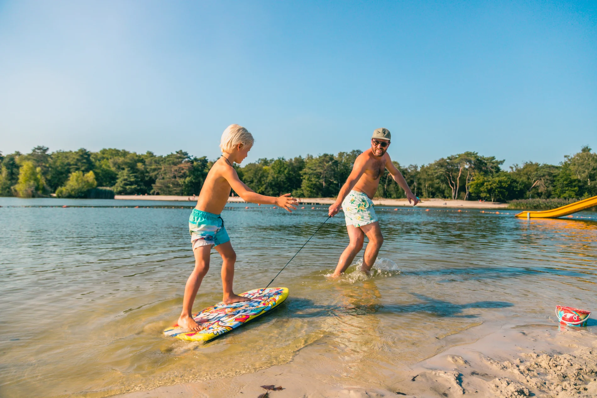 EuroParcs Zilverstrand Father Kid Beach Water Surf Board