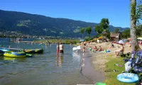 Ossiacher See meer strand mensen kinderen plezier zwemmen