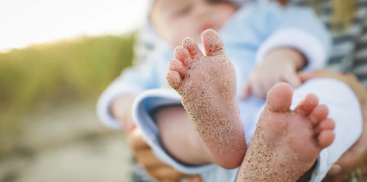 Baby friendly holidays - sandy baby feet - EuroParcs