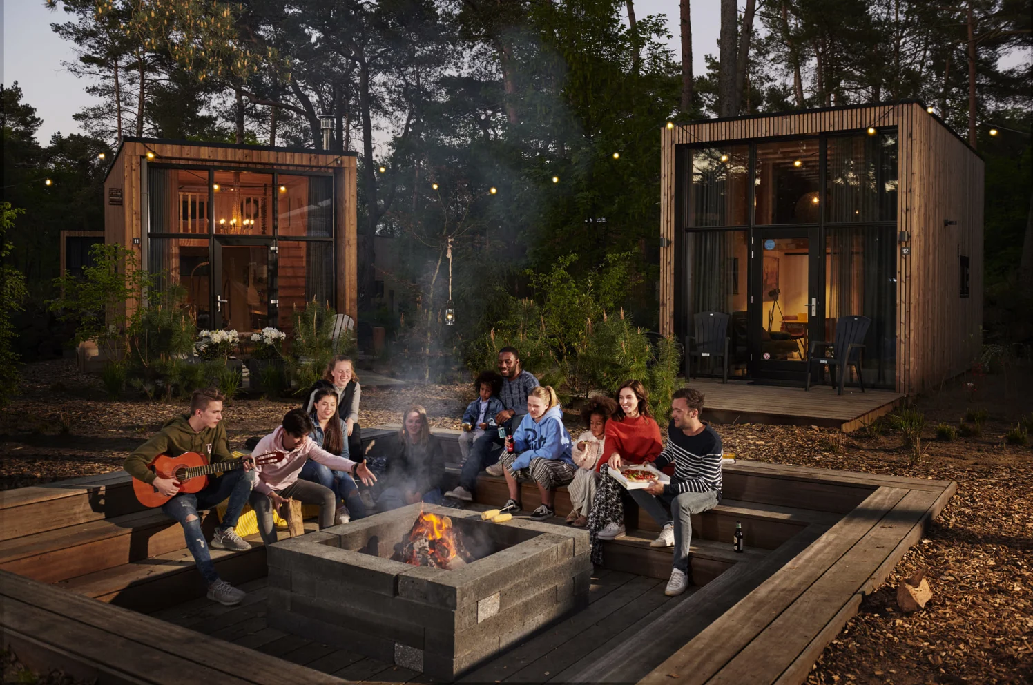 De Zanding Group Friends Fire Pit Tiny Houses Night